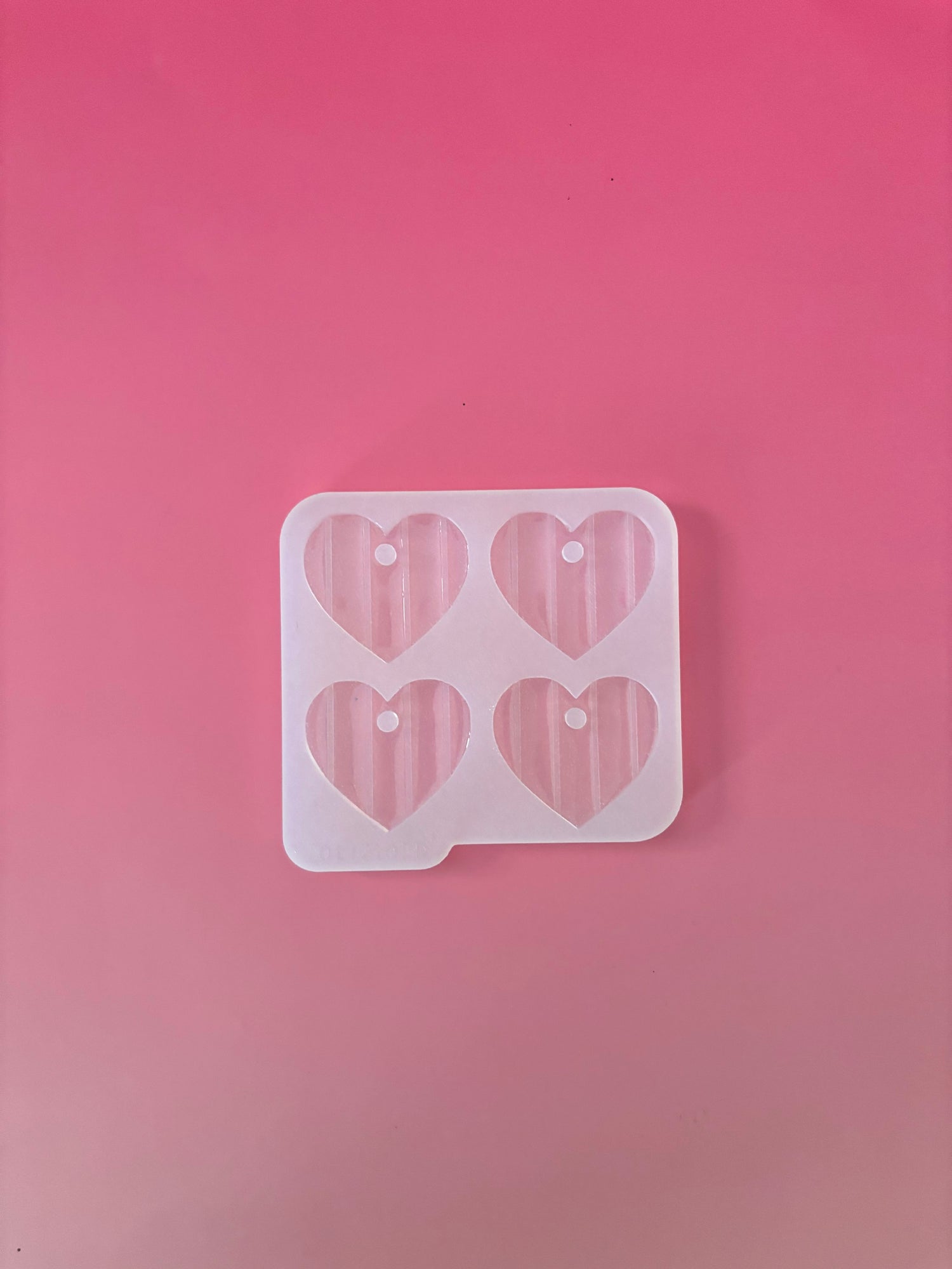 Moule silicone médaille/porte-clé FLEUR RAYURES - 4 pièces