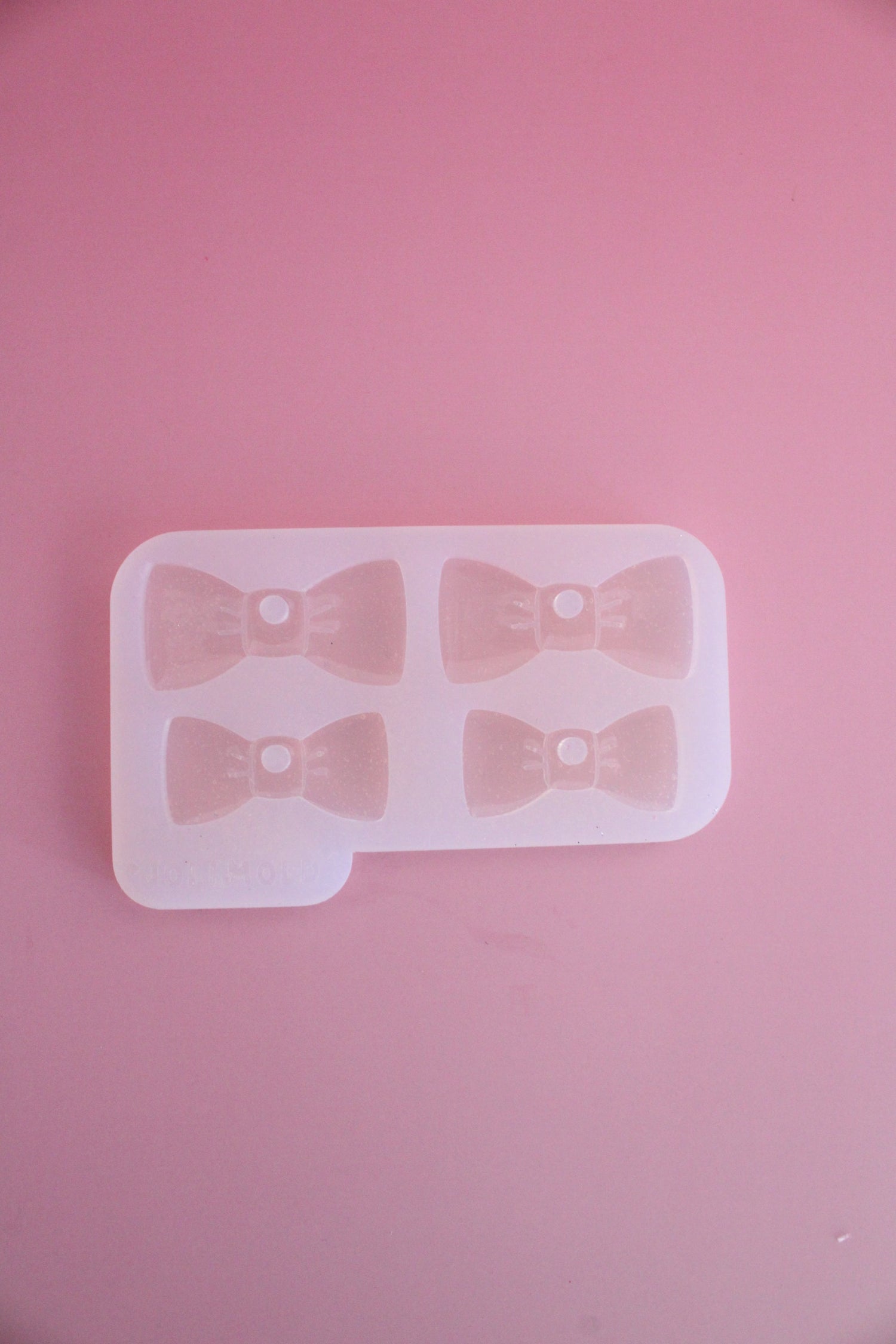 Moule silicone médaille NOEUD PAPILLON - 2 tailles